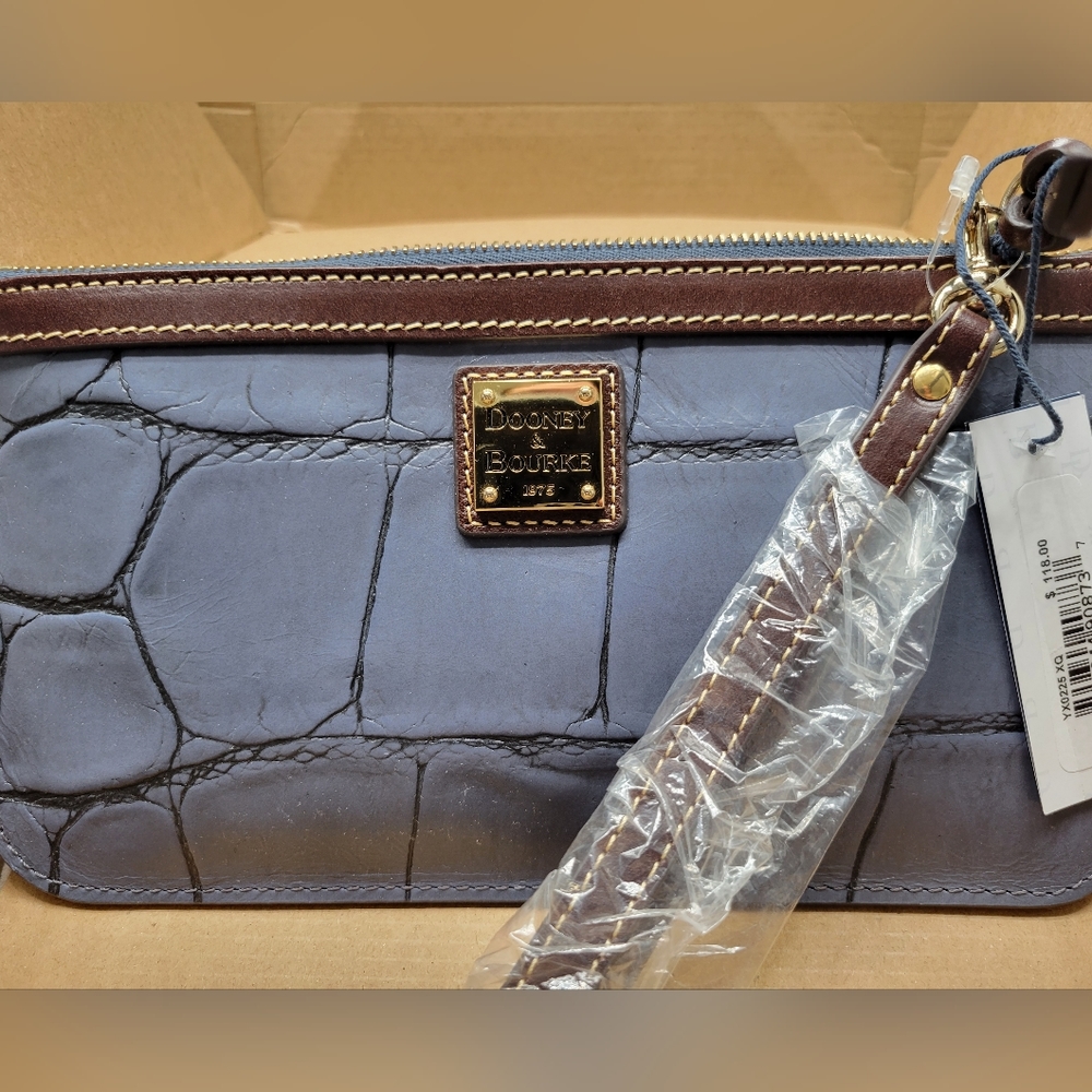 Dooney and Bourke grey wristlet, never used